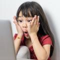 Little girl shocked by what she finds on the Internet