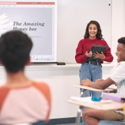 Girl gives presentation in front of class